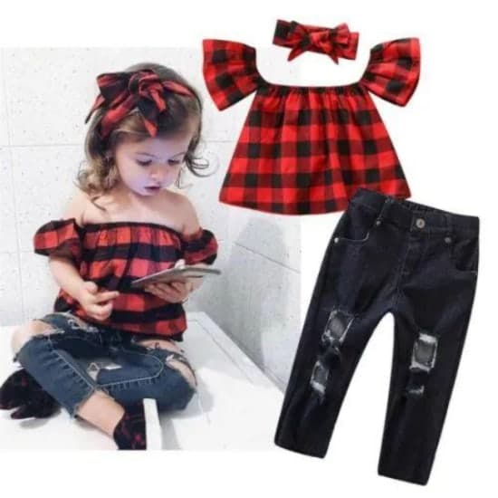 Red off shoulder shirt and black denim rip trouser