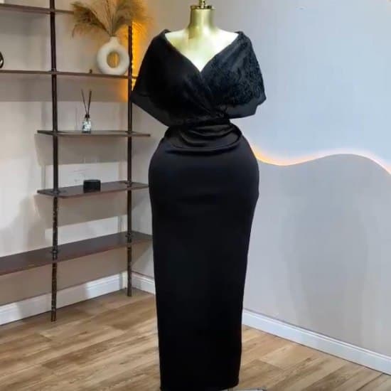 Elegant Black, Timeless luxury dress- Chic dress and Solid. A must have for your wardrobe.